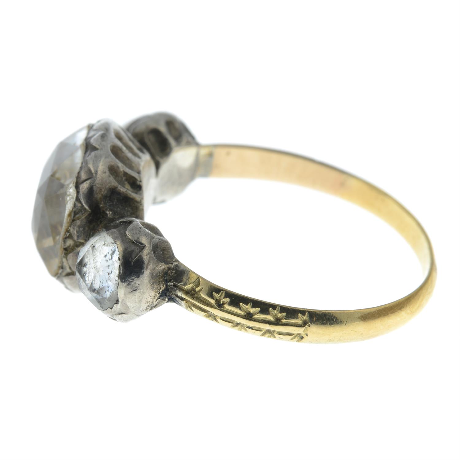 A 17th to 18th century silver and gold foil back rock crystal three-stone ring, with traces of - Image 3 of 5