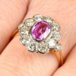 A pink sapphire and brilliant-cut diamond cluster ring.