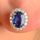 A pair of sapphire and brilliant-cut diamond cluster earrings.