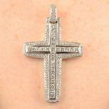 A vari-cut diamond cross pendant.