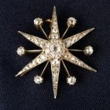 A late 19th century silver and gold old and rose-cut diamond star brooch.