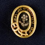A late 19th century 15ct gold, rose-cut diamond forget-me-not and black enamel 'In Memory Of'