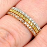 A set of three 18ct gold diamond and 'yellow' diamond 'Aura' band rings, by De Beers.