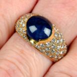 A cabochon sapphire and pavé-set diamond dress ring.