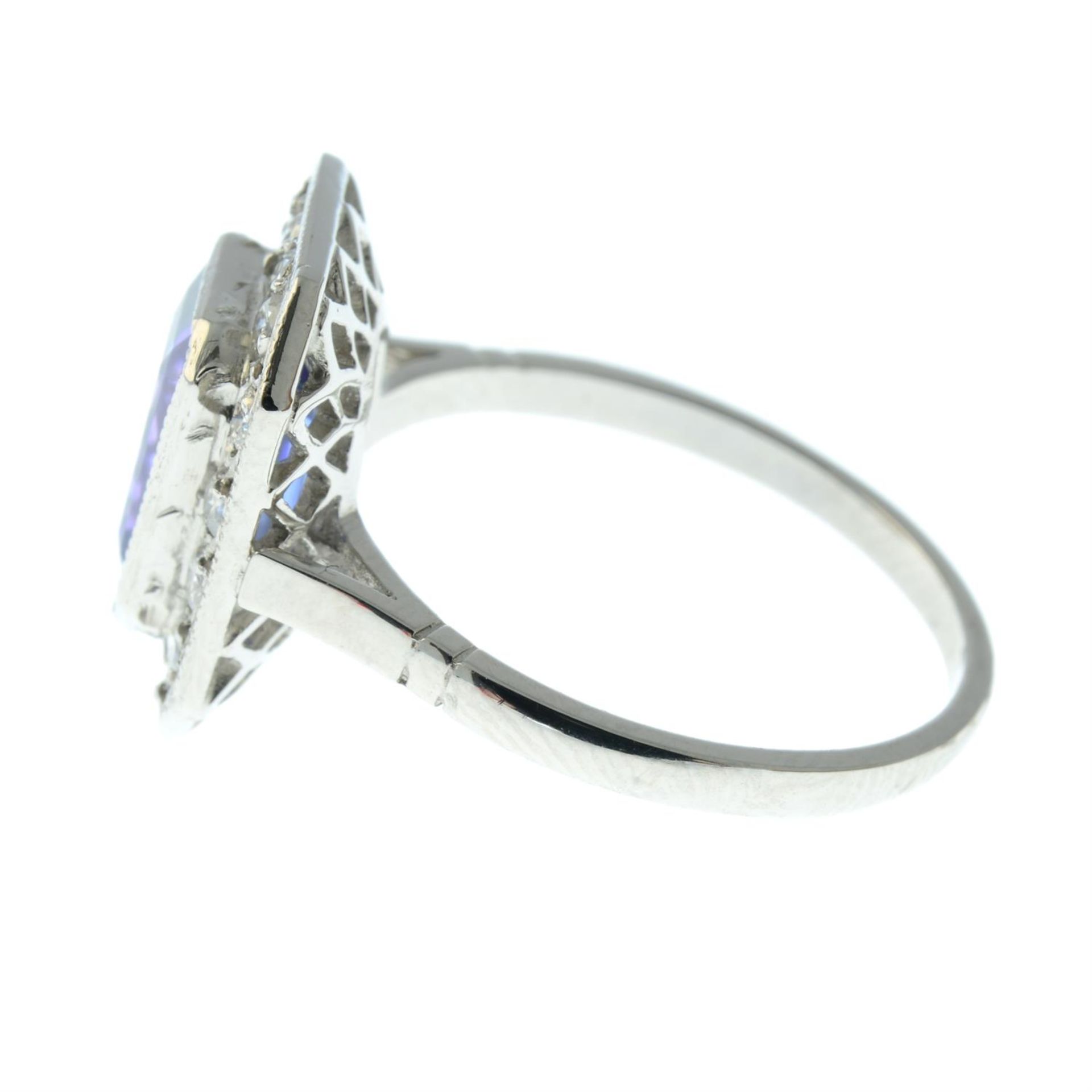 A tanzanite and brilliant-cut diamond cluster ring. - Image 3 of 5