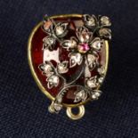 A 19th century gold garnet stickpin, with ruby and rose-cut diamond floral overlay,