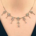 A brilliant-cut diamond floral fringe necklace.