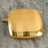 An Edwardian 18ct gold vesta case, with ruby bezel highlight.