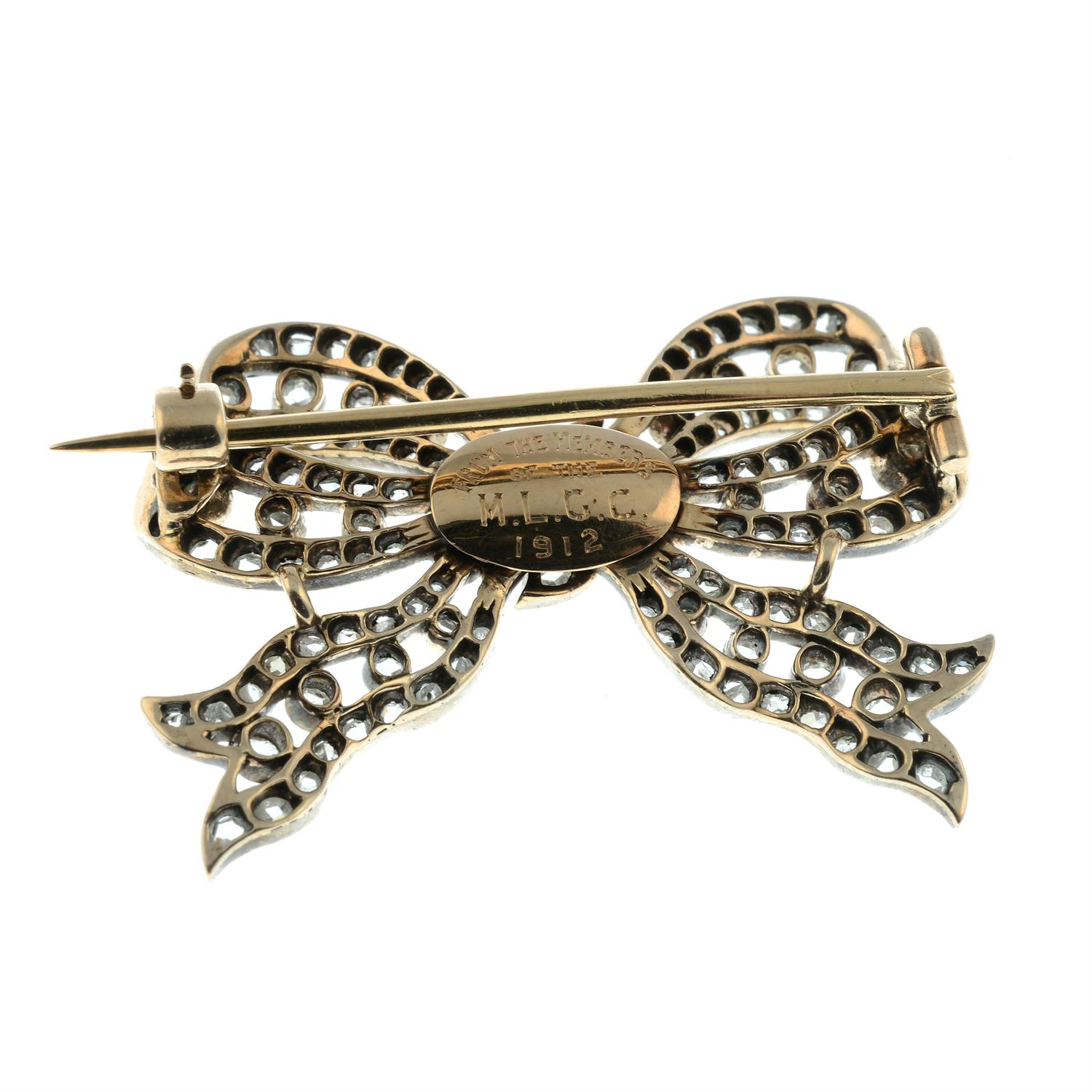 An early 20th century silver and gold old and rose-cut diamond bow brooch. - Image 3 of 4