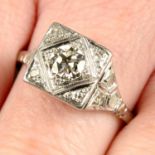 A circular-cut diamond single-stone geometric ring, with single-cut diamond surround and diamond