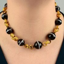 A composite Georgian gold textured belcher-link and 19th century graduated banded agate bead