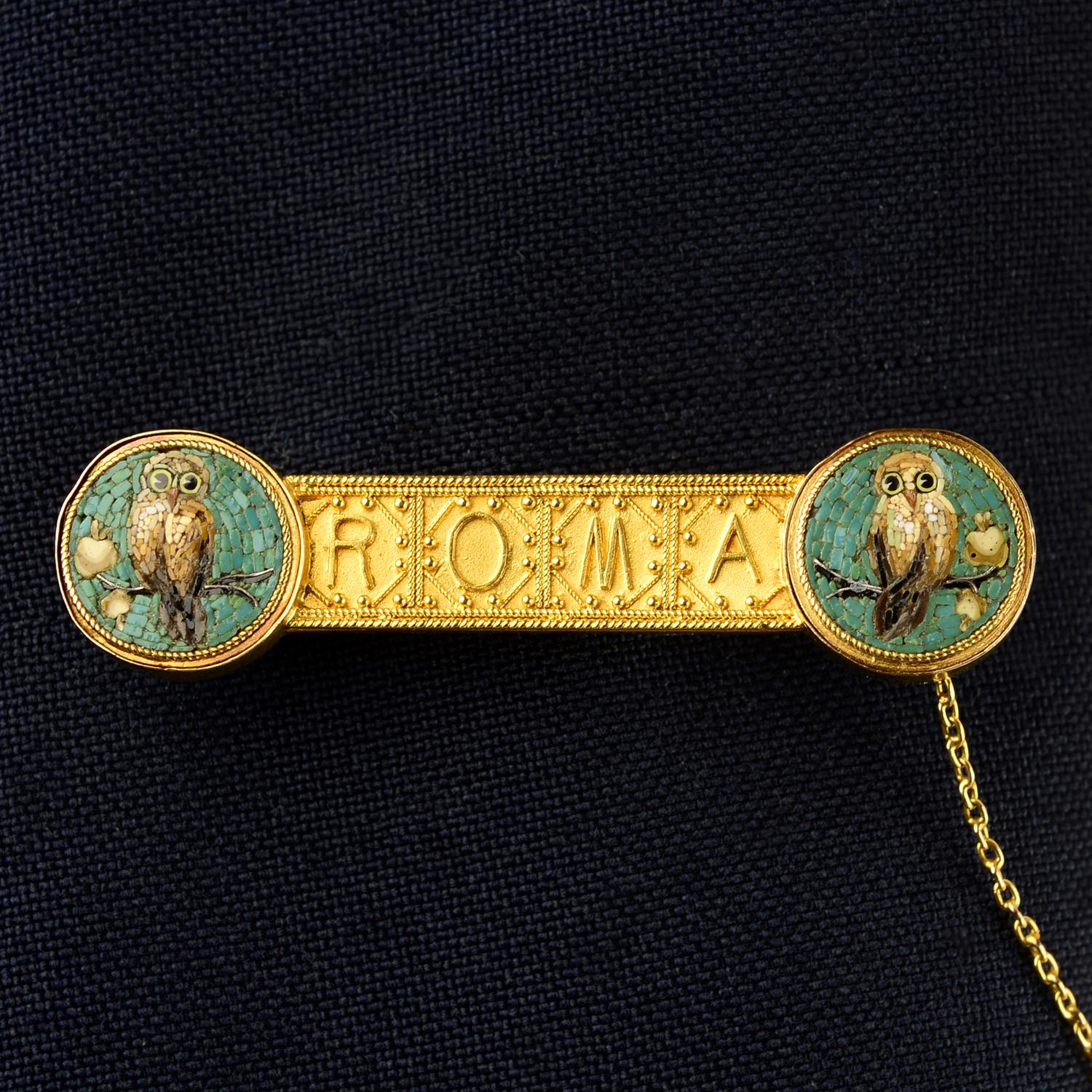 A late 19th century gold cannetille 'ROMA' brooch, with micro mosaic owl terminals.