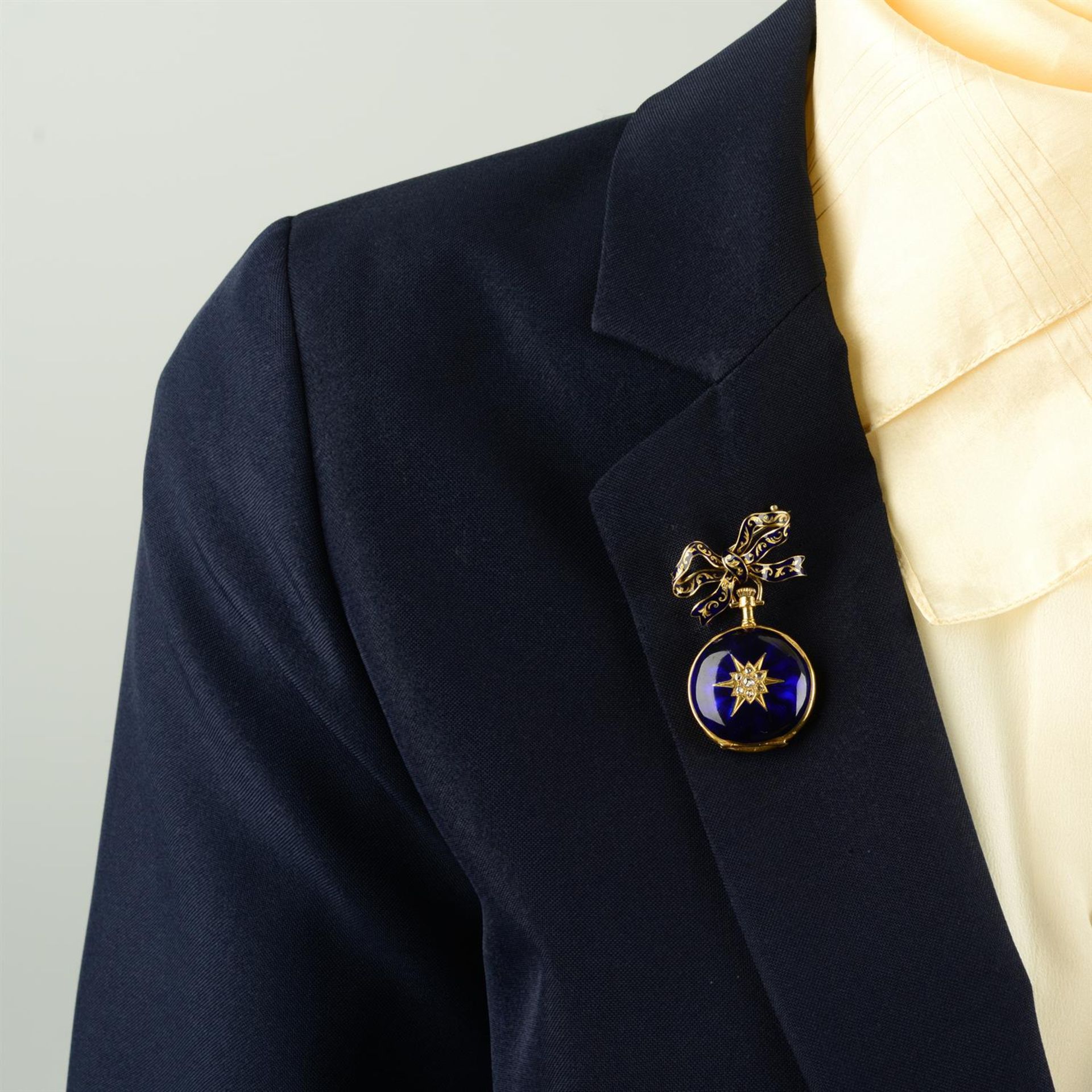 A late 19th century 18ct gold rose-cut diamond star and blue enamel fob watch, suspended from a - Image 4 of 4