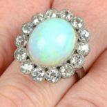 An opal and old-cut diamond cluster ring.