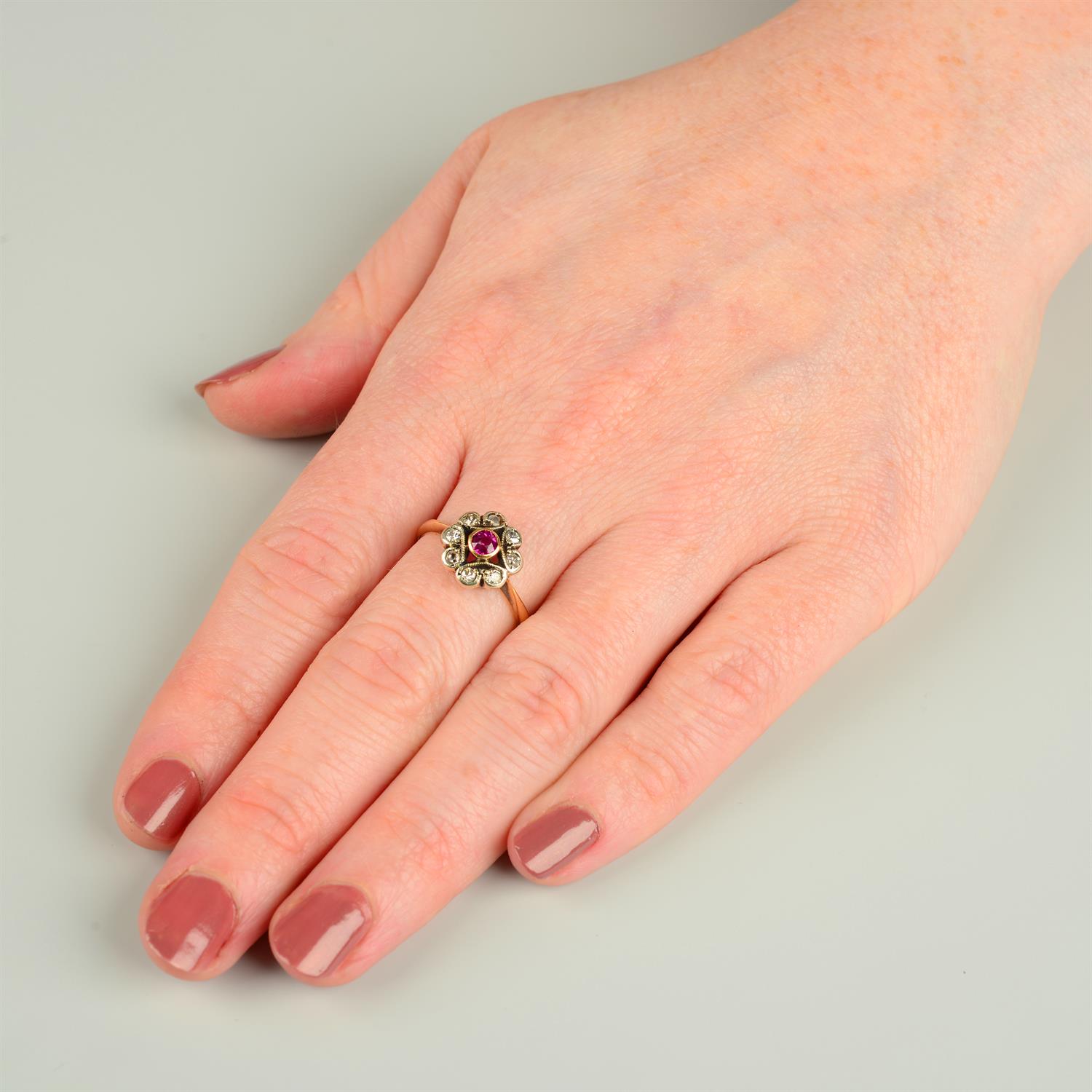 A mid 20th century 18ct gold ruby and single-cut diamond floral cluster ring. - Image 4 of 4