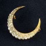 An early 20th century 18ct gold old and rose-cut diamond crescent brooch.
