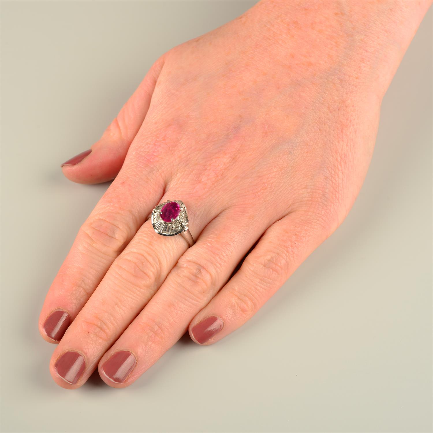 A ruby and vari-cut diamond cluster ring. - Image 5 of 5