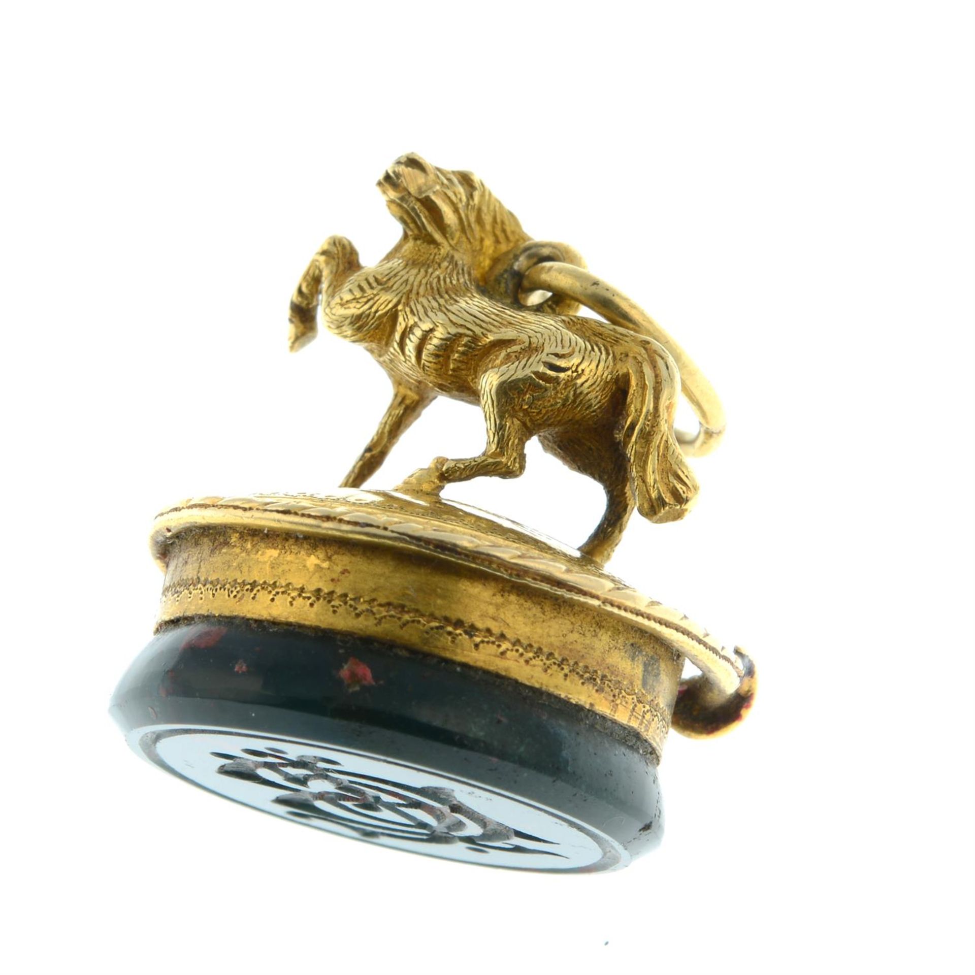 A Victorian gold bloodstone seal, with figural horse and encircling whip. - Image 4 of 4