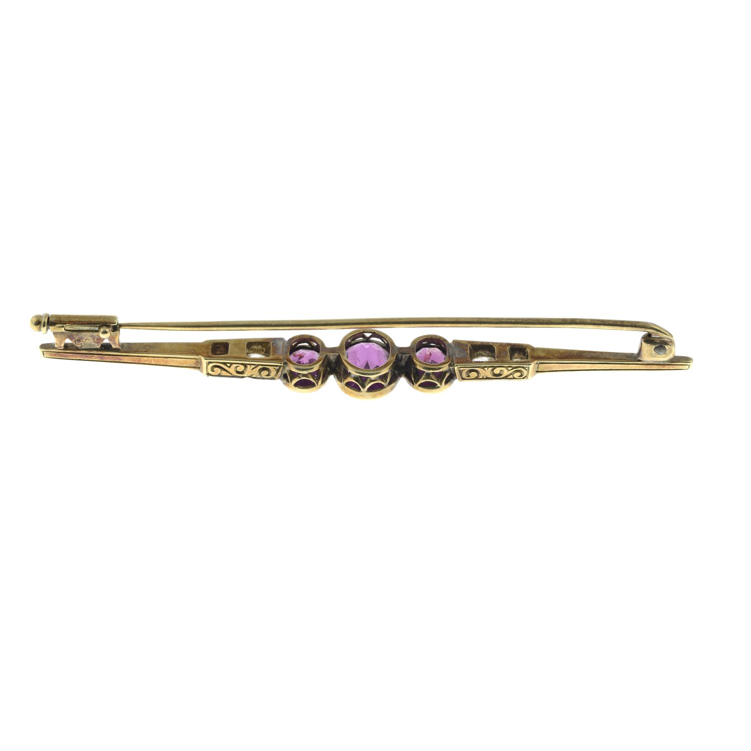 An early to mid 20th century 14ct gold garnet and old-cut diamond bar brooch. - Image 3 of 4