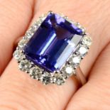 An 18ct gold tanzanite and brilliant-cut diamond cluster ring.