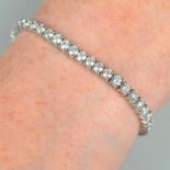 A brilliant-cut diamond line bracelet.