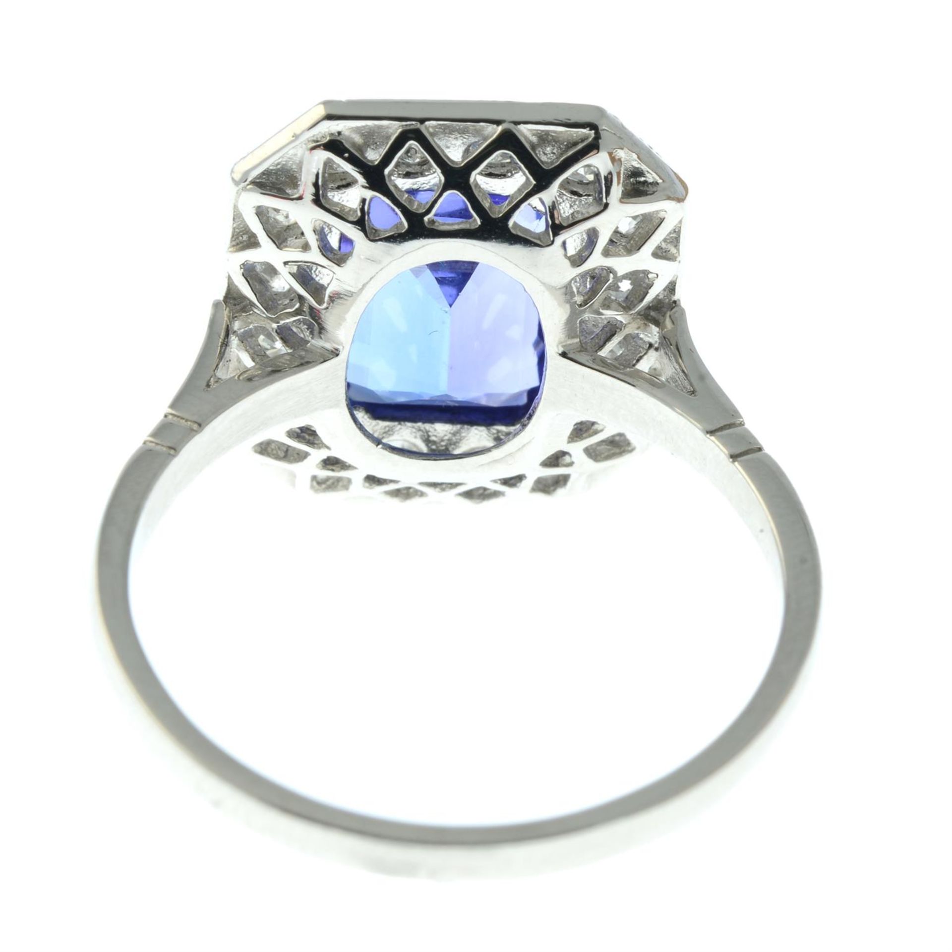 A tanzanite and brilliant-cut diamond cluster ring. - Image 4 of 5