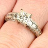 A square-shape diamond ring, with square-shape diamond shoulders and brilliant-cut diamond sides.