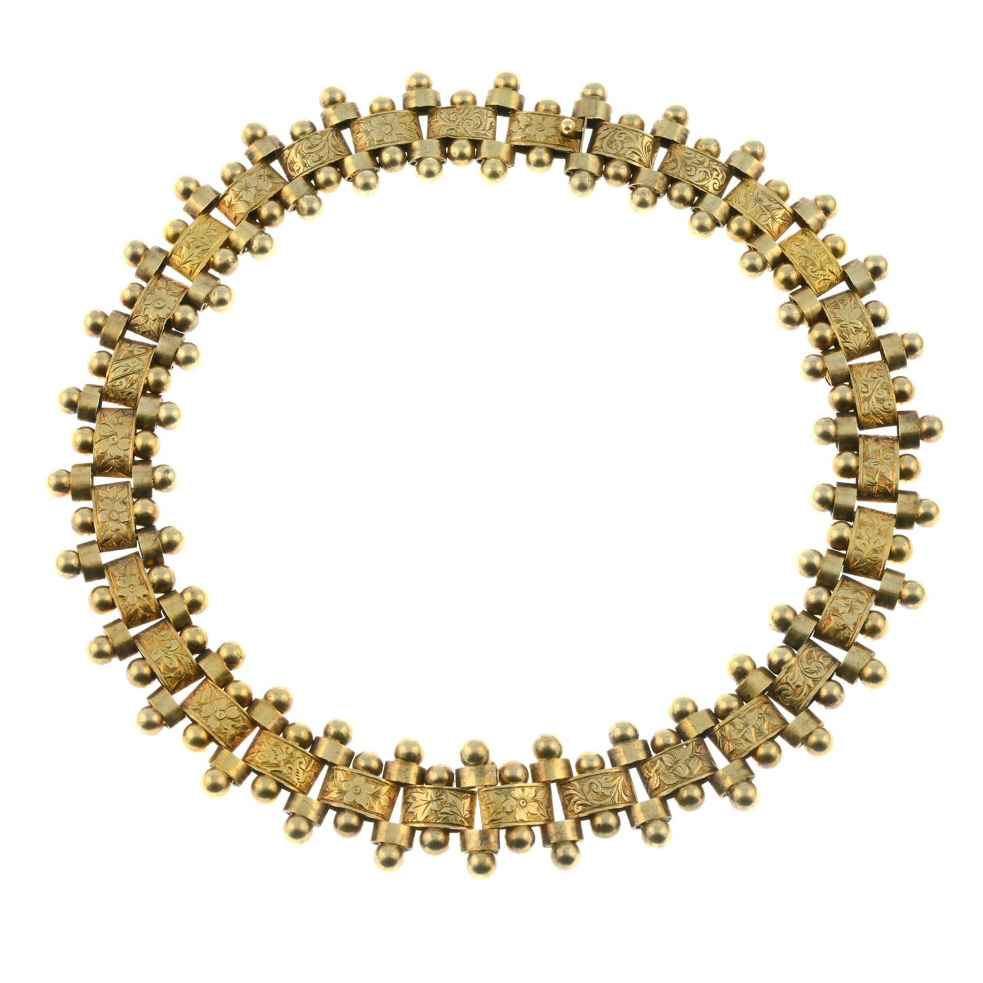A late Victorian gold floral engraved and bead motif collar necklace. - Image 2 of 3
