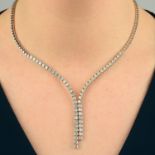 A brilliant-cut diamond asymmetric two-row necklace, with disc-link back-chain.