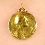 An Art Nouveau gold 'The Night' pendant, with rose-cut diamond 'star' highlights,