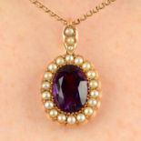 An early 20th century 15ct gold amethyst and split pearl pendant, with 9ct gold chain.