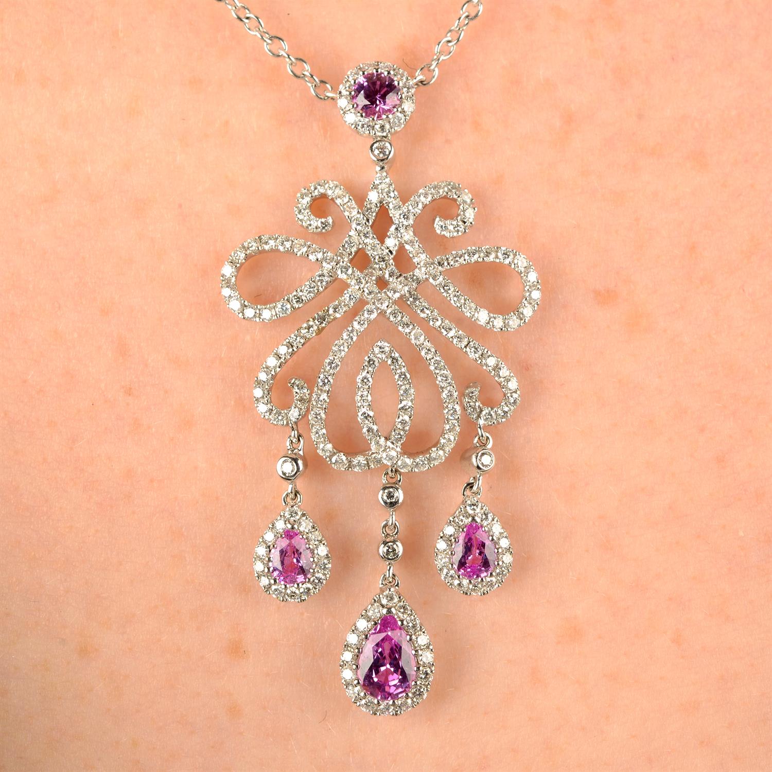 A brilliant-cut diamond and pink sapphire necklace.