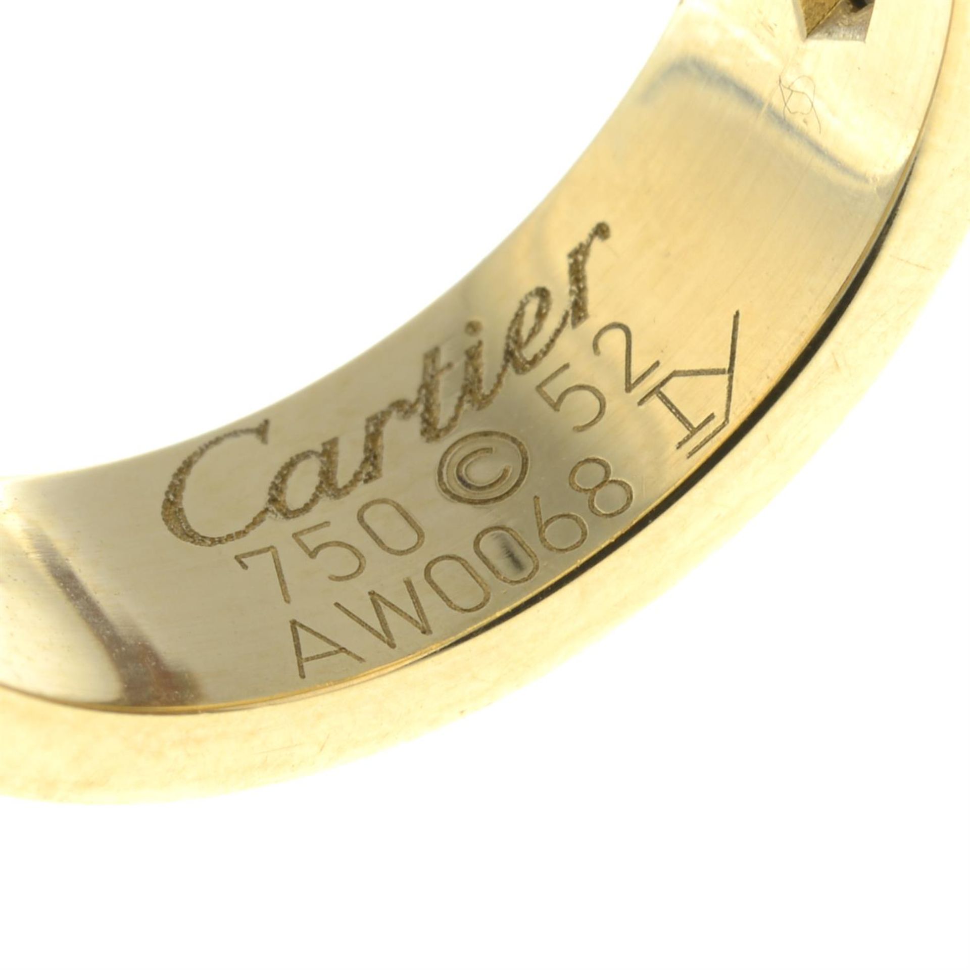 A brilliant-cut diamond 'Love' ring, by Cartier. - Image 4 of 5