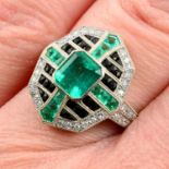 An emerald, onyx and diamond geometric dress ring.