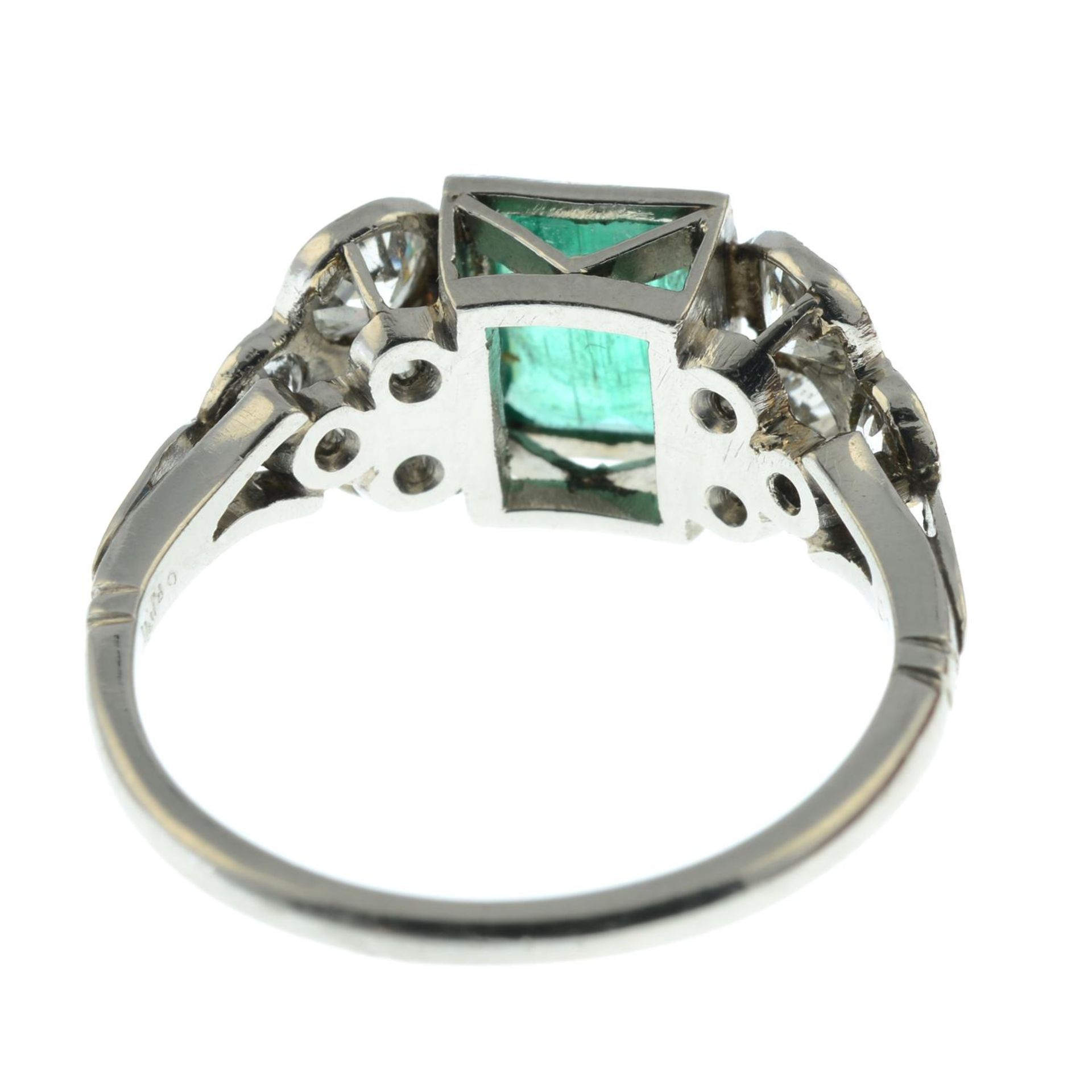 An emerald dress ring, with graduated old-cut diamond trefoil sides. - Image 4 of 5