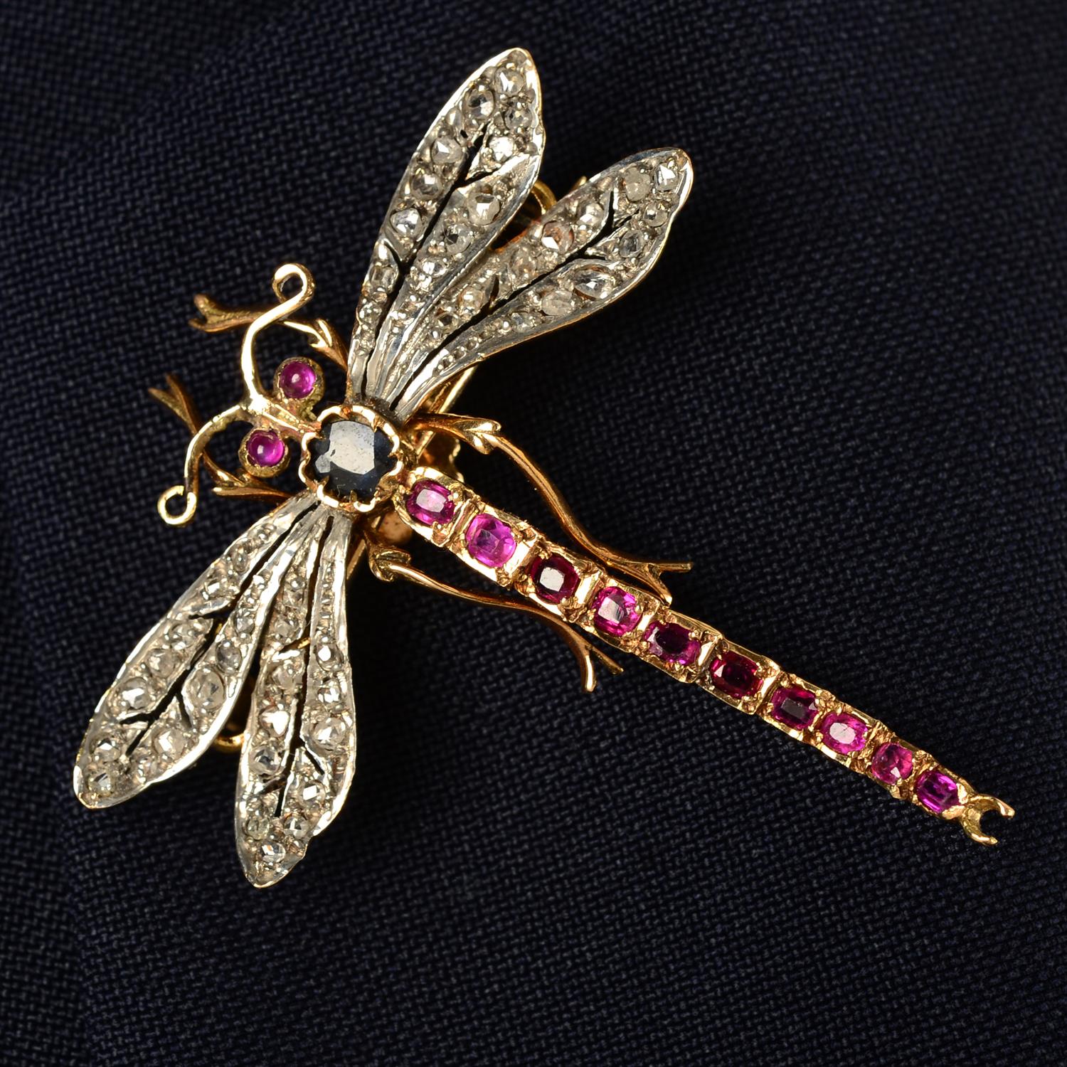 A late 19th century ruby, rose-cut diamond and sapphire dragonfly brooch.