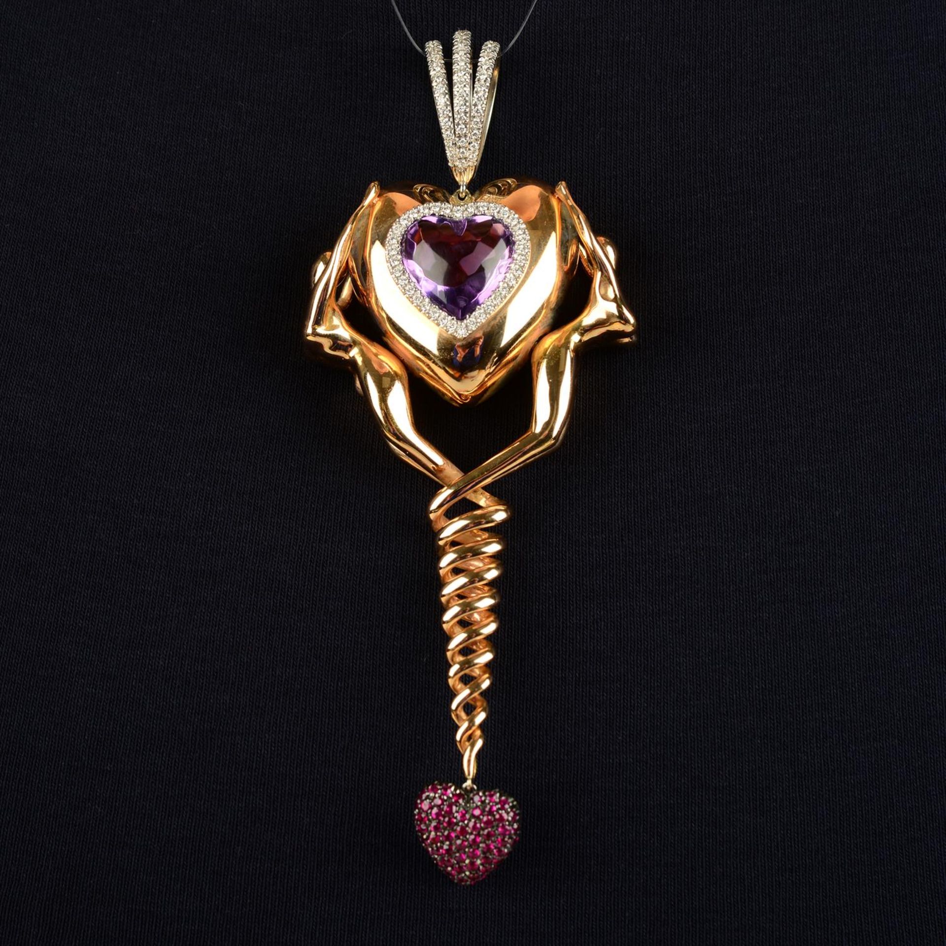 An amethyst cabochon heart and diamond 'Philosophy of Love' pendant, with pavé-set ruby heart drop,