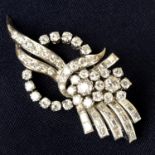 A mid 20th century 18ct gold vari-cut diamond brooch.