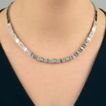 A vari-cut diamond necklace.