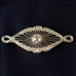 An early to mid 20th century bi-colour 18ct gold old-cut diamond brooch.