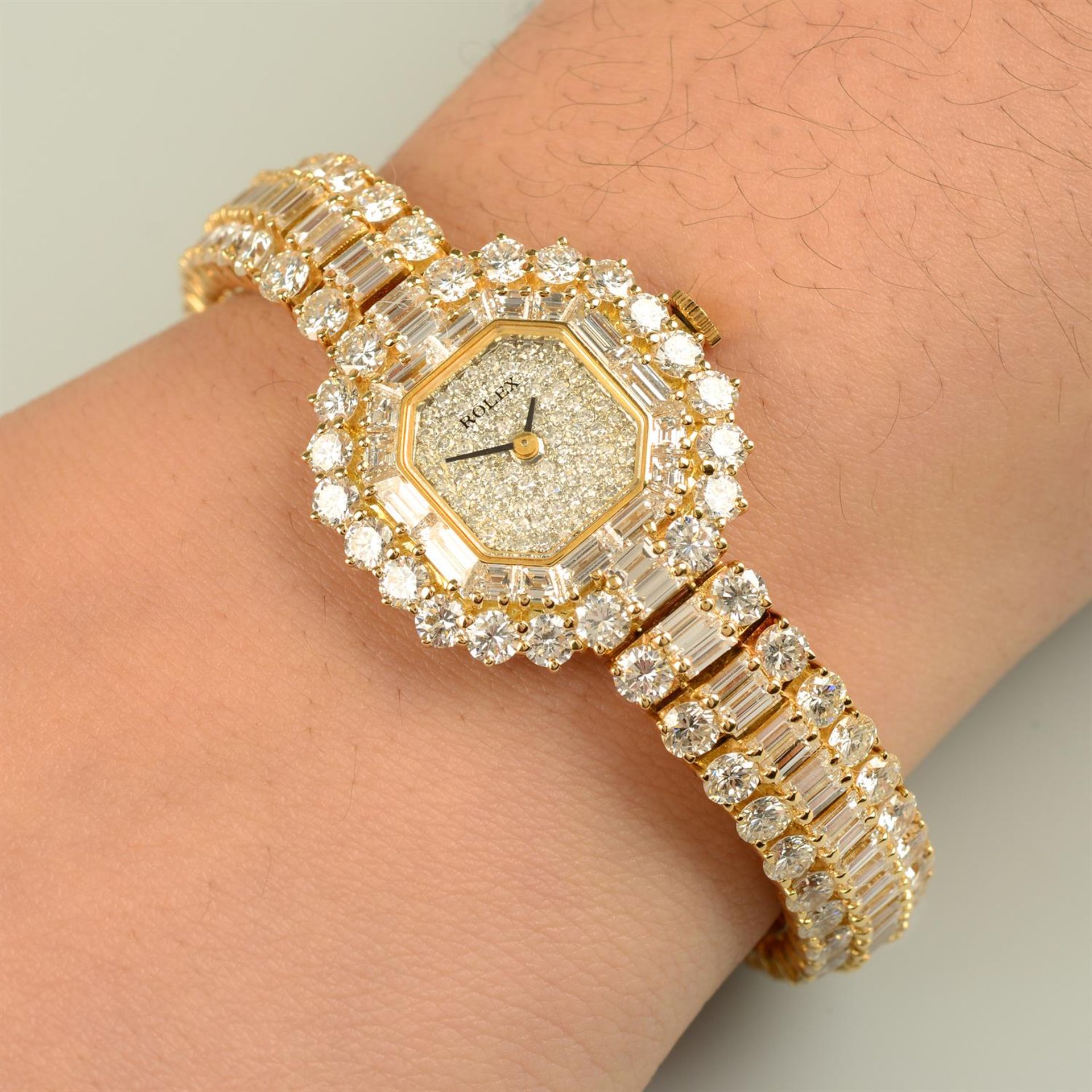 An 18ct gold vari-shape diamond watch, by Rolex.