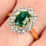 An 18ct gold emerald and brilliant-cut diamond cluster ring, by Cropp & Farr.