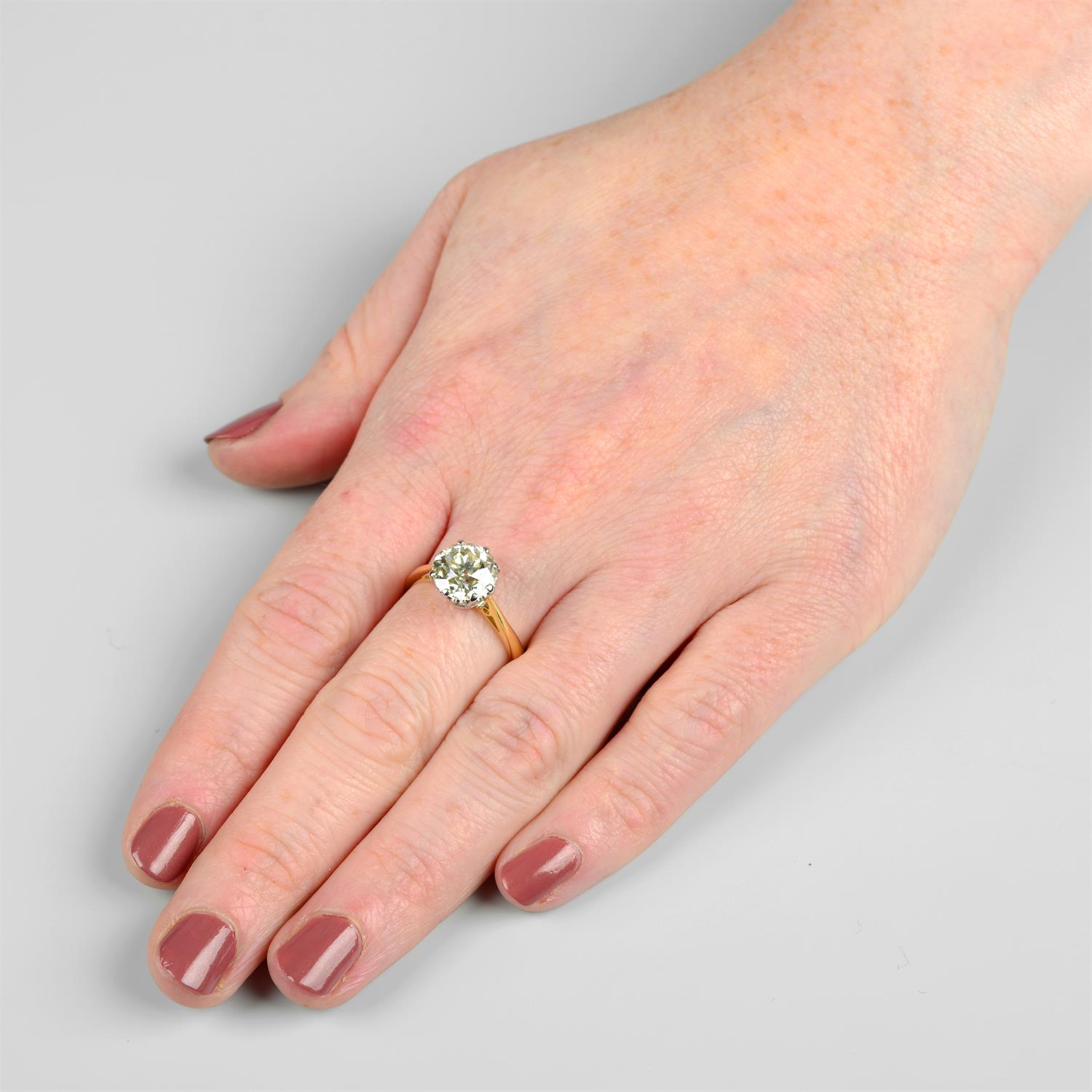 An 18ct gold circular-cut diamond single-stone ring. - Image 5 of 5