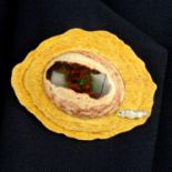 An 18ct gold boulder opal and single-cut diamond brooch, with textured, stepped surrounds, by Grima.