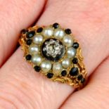 A Georgian 18ct gold black garnet, split pearl and old-cut diamond mourning ring,