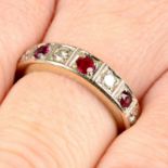 A ruby and brilliant-cut diamond half eternity ring.
