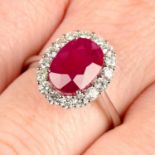 An 18ct gold ruby and brilliant-cut diamond cluster ring.