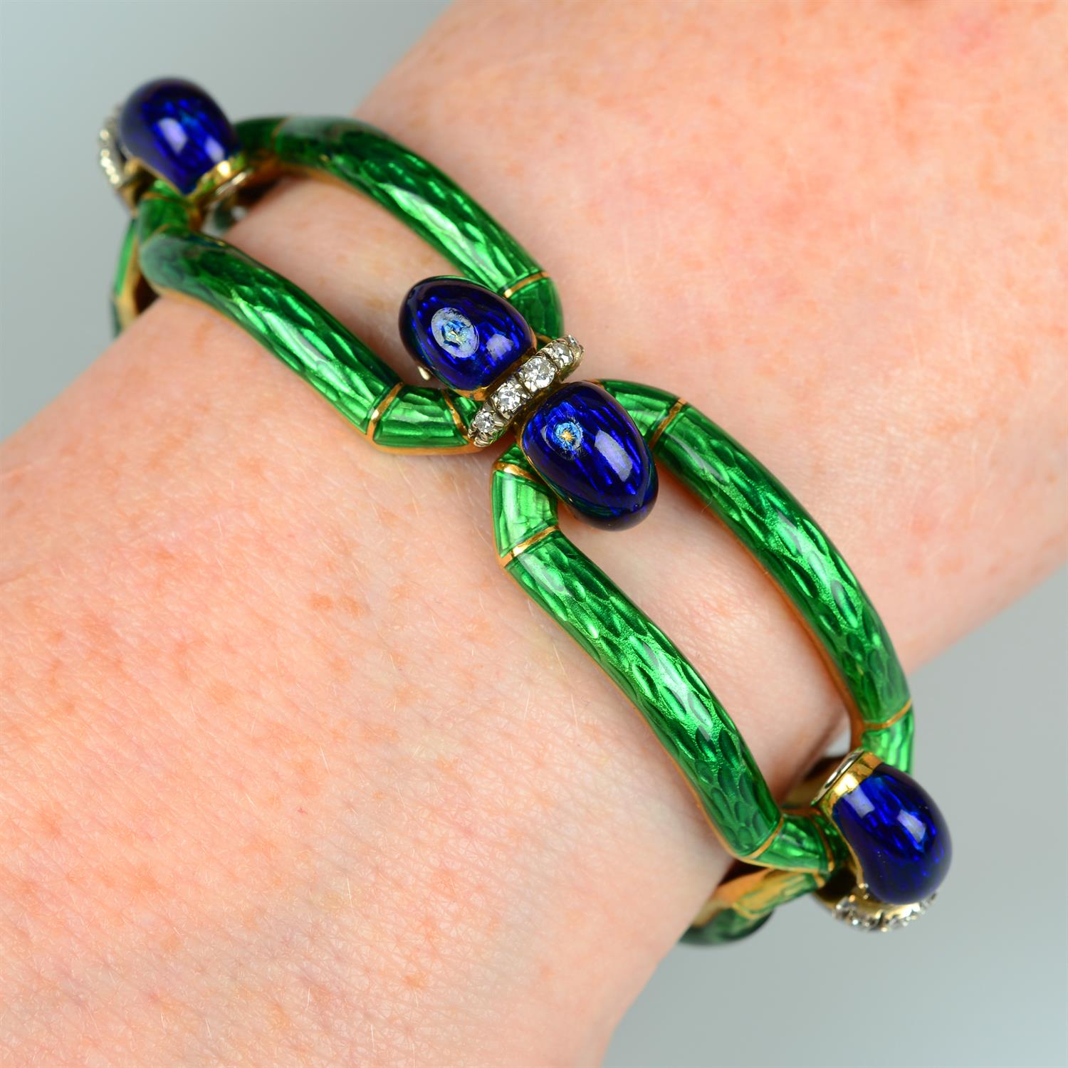 A mid 20th century Italian 18ct gold blue and green enamel and single-cut diamond bracelet.