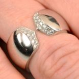 A pavé-set diamond open band ring, by Cartier.