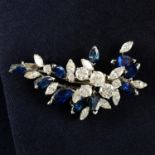 A mid 20th century 18ct gold vari-cut diamond and sapphire floral brooch, by Gübelin.